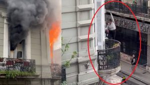 Desesperación: video de una mujer de 75 años que se colgó de un cable para salvarse de un incendio